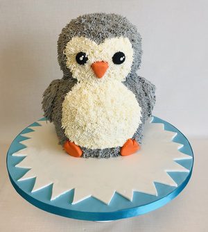 Percy the Penguin carved novelty sponge cake
